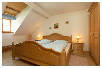 Schlafzimmer der Ferienwohnung Wachsbichl - Ferienwohnungen Fabian und Heidi Hosp - Unterammergau